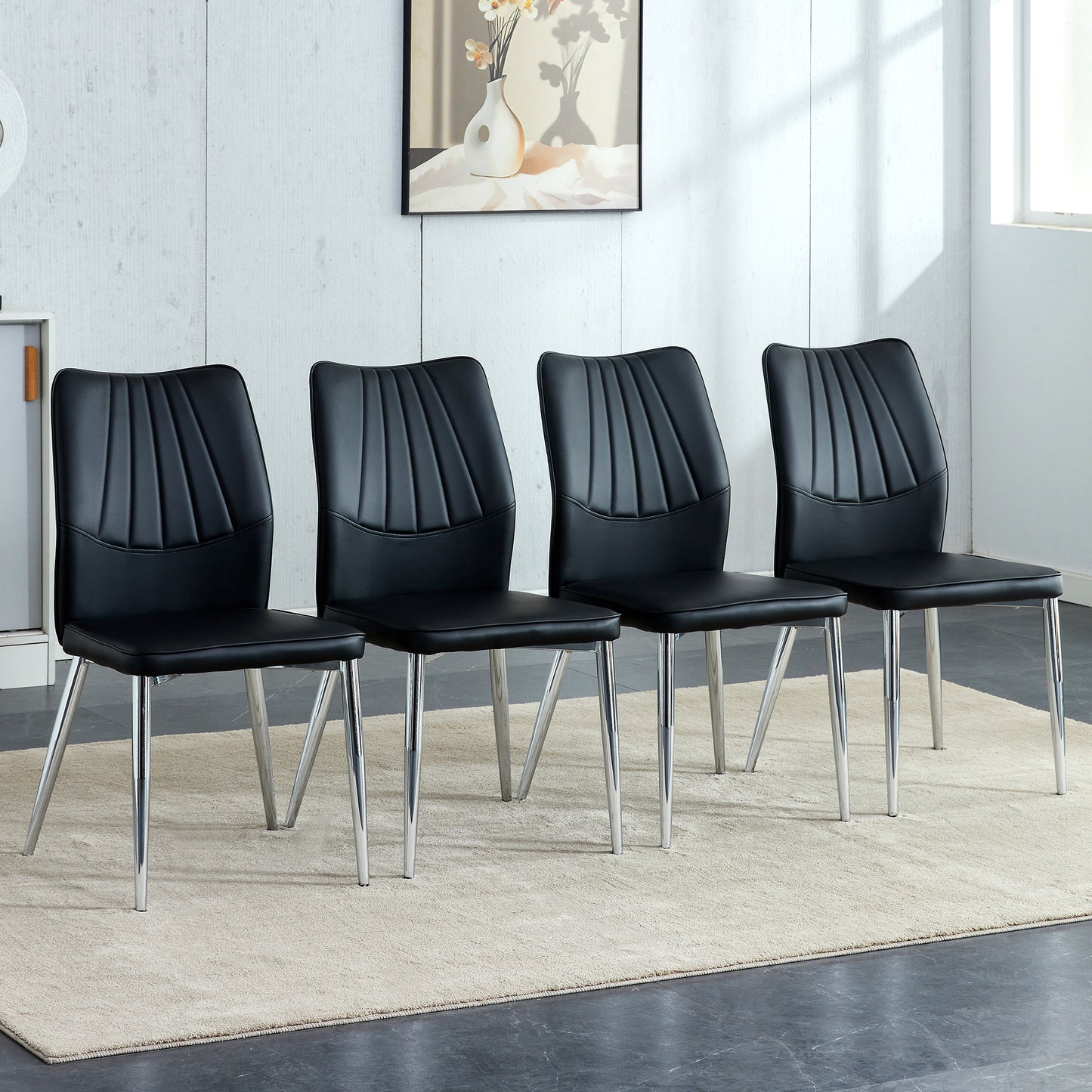 Four black dining chairs. Modern chairs from the Middle Ages. Made of PU material cushion and silver metal legs. Suitable for restaurants and living rooms.W1151135495