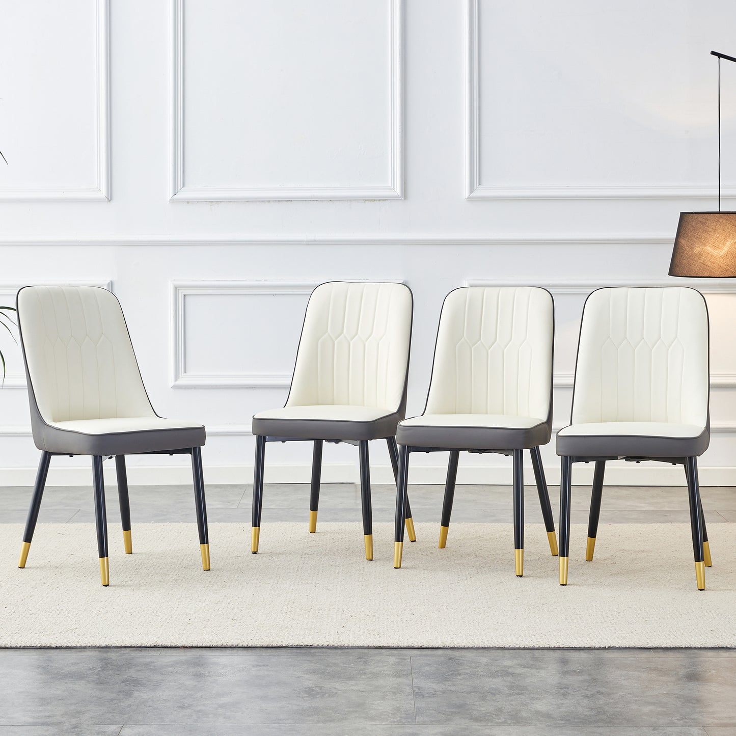 A modern dining chair with a white dark gray dual tone PU leather backrest and black metal legs, suitable for kitchens, bedrooms, and offices. A set of 4 pieces (white+dark gray+PU)C-007 W1151118960