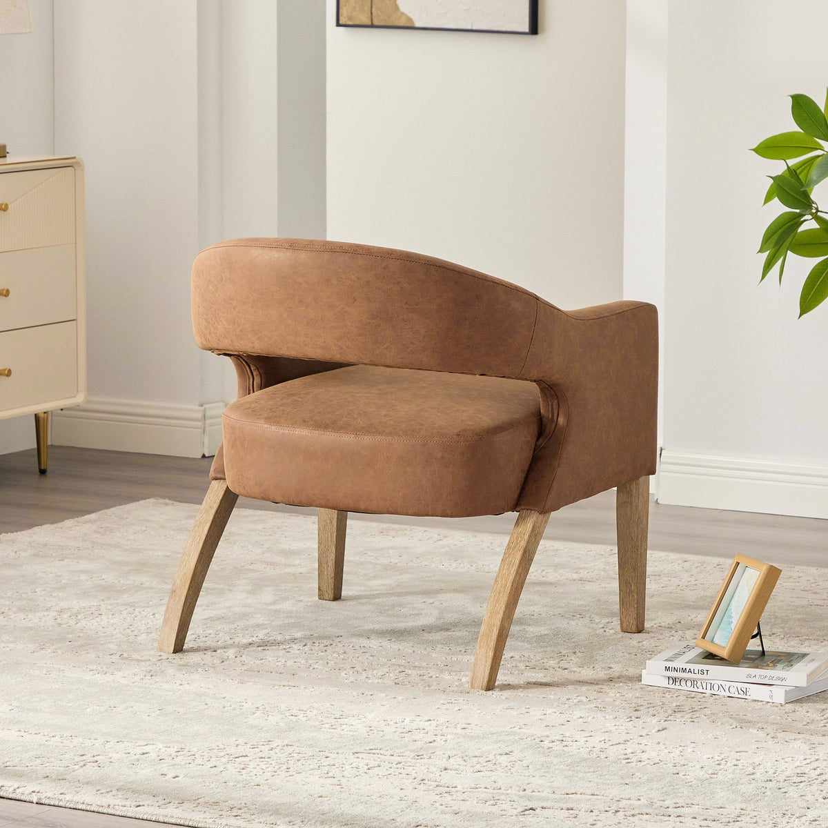 Modern Upholstered PU Open Back Accent Armchair Barrel Dining Chair with Weathered Rubberwood Legs, Hollow-Out Side Club Chair for Living Room Bedroom Restaurant Cafes Dining Room Reception,Brown