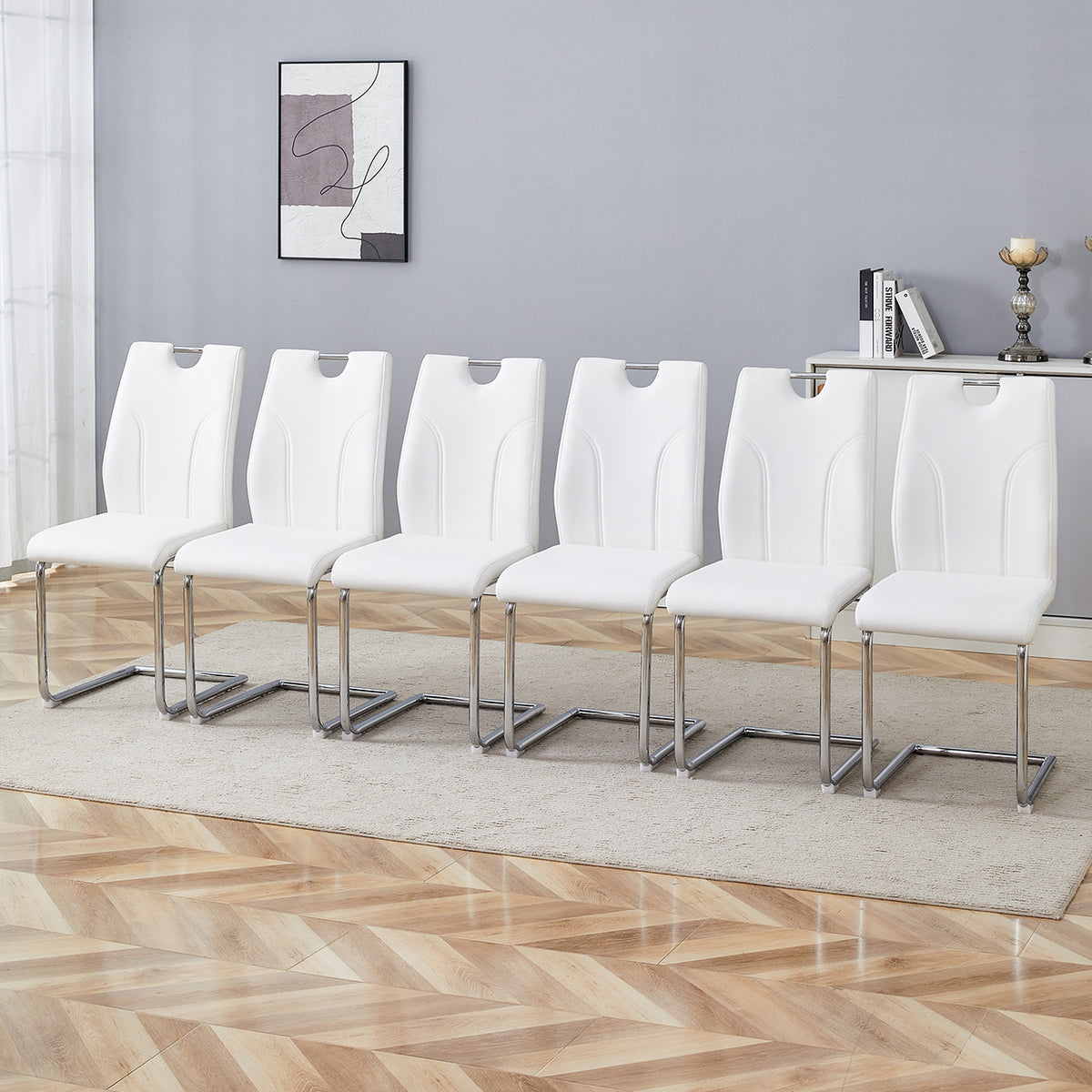 White PU Dining Chair Set.Uniquely designed white dining chairs. PU material, paired with silver metal chair legs. Suitable for offices, restaurants, kitchens, conference rooms(set of 6)W2920P454806
