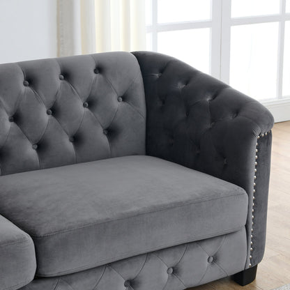 Velvet Chelsfield Sofa Set, featuring extra-deep seat cushions with padded armrests, tufted buttons, and brass studs, complete with throw pillows and plastic legs