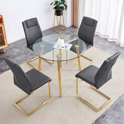 A modern minimalist style round transparent tempered glass table with gold metal legs, paired with 4 modern PU leather high-back dining chairs,bringing you a luxurious experience.