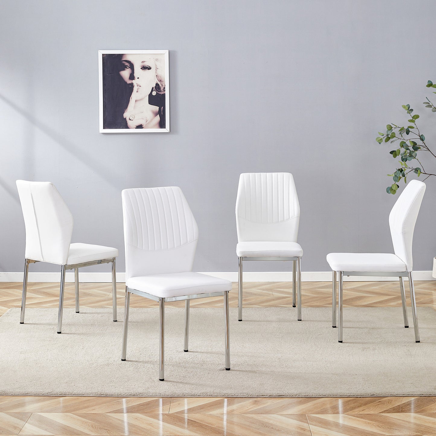 Luxury Simple Chair - Set of 4 White PU Material High Resilience Dining Chair with Metal Silver Leg.The Chair Back Has a Vertical Stripe Design With Smooth And Uniform Lines.