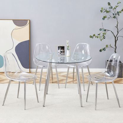 Table and chair set.A modern minimalist style round transparent tempered glass table, silver metal legs, paired with 4 modern style transparent dining chairs,bringing a luxurious experience.
