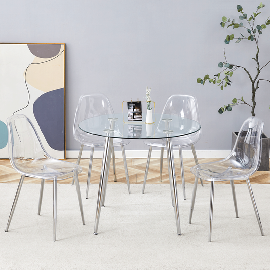 Table and chair set.A modern minimalist style round transparent tempered glass table, silver metal legs, paired with 4 modern style transparent dining chairs,bringing a luxurious experience.