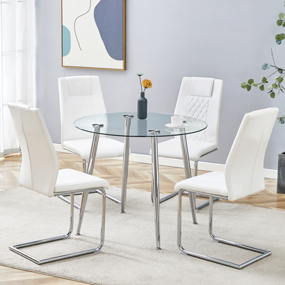 A modern minimalist round transparent tempered glass table with silver metal legs and 4 white modern PU leather high-backed dining chairs for a luxurious experience.