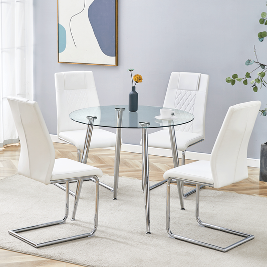 A modern minimalist round transparent tempered glass table with silver metal legs and 4 white modern PU leather high-backed dining chairs for a luxurious experience.