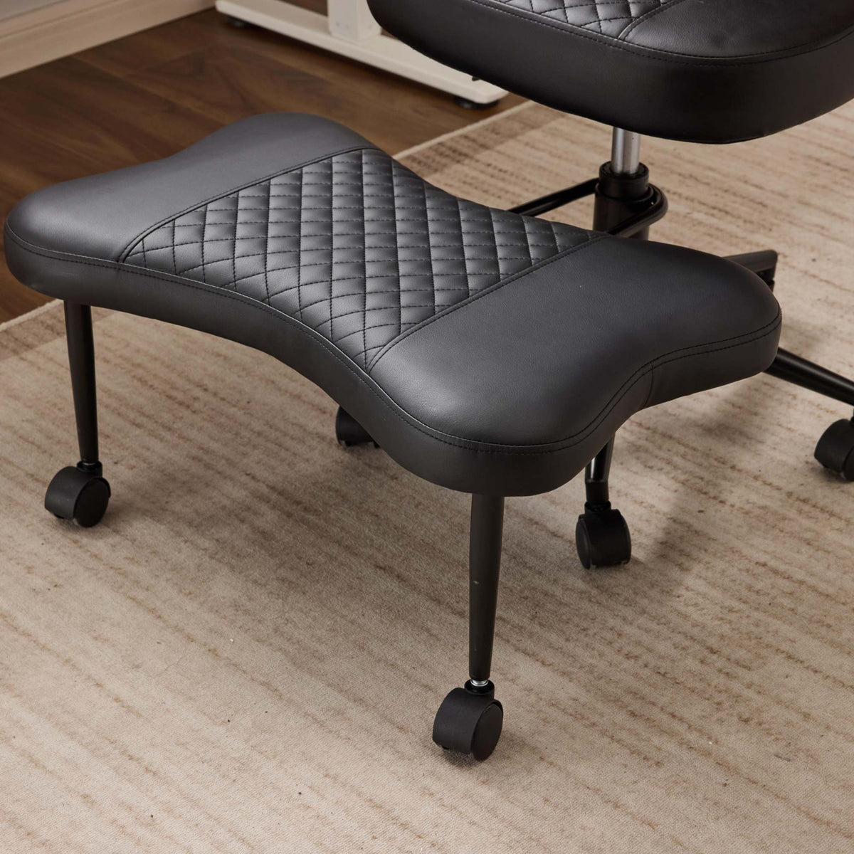 Meditation chair, an ergonomic cross-legged seating chair with lumbar support and a height-adjustable seat cushion, ideal for people engaged in high-intensity office work. Black