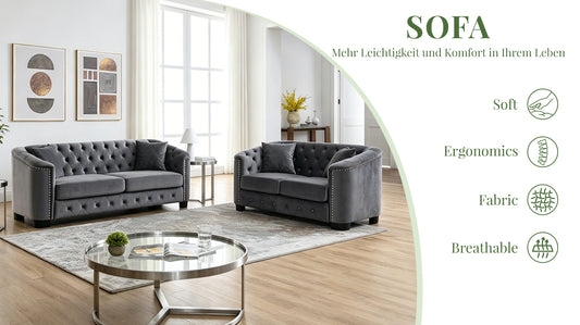 Velvet Chelsfield Sofa Set, featuring extra-deep seat cushions with padded armrests, tufted buttons, and brass studs, complete with throw pillows and plastic legs