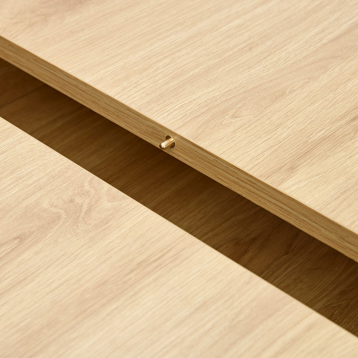 An expandable dining table with storage space