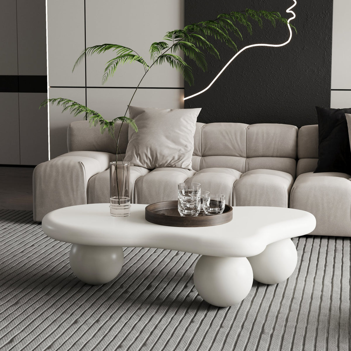 40 Inch Cloud Shaped Coffee Table with 3 Ball Legs, Cream White