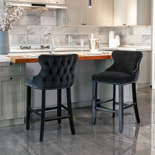 A&A Furniture, Contemporary Velvet Upholstered Wing-Back Barstools with Button Tufted Decoration and Wooden Legs, and Chrome Nailhead Trim - Black