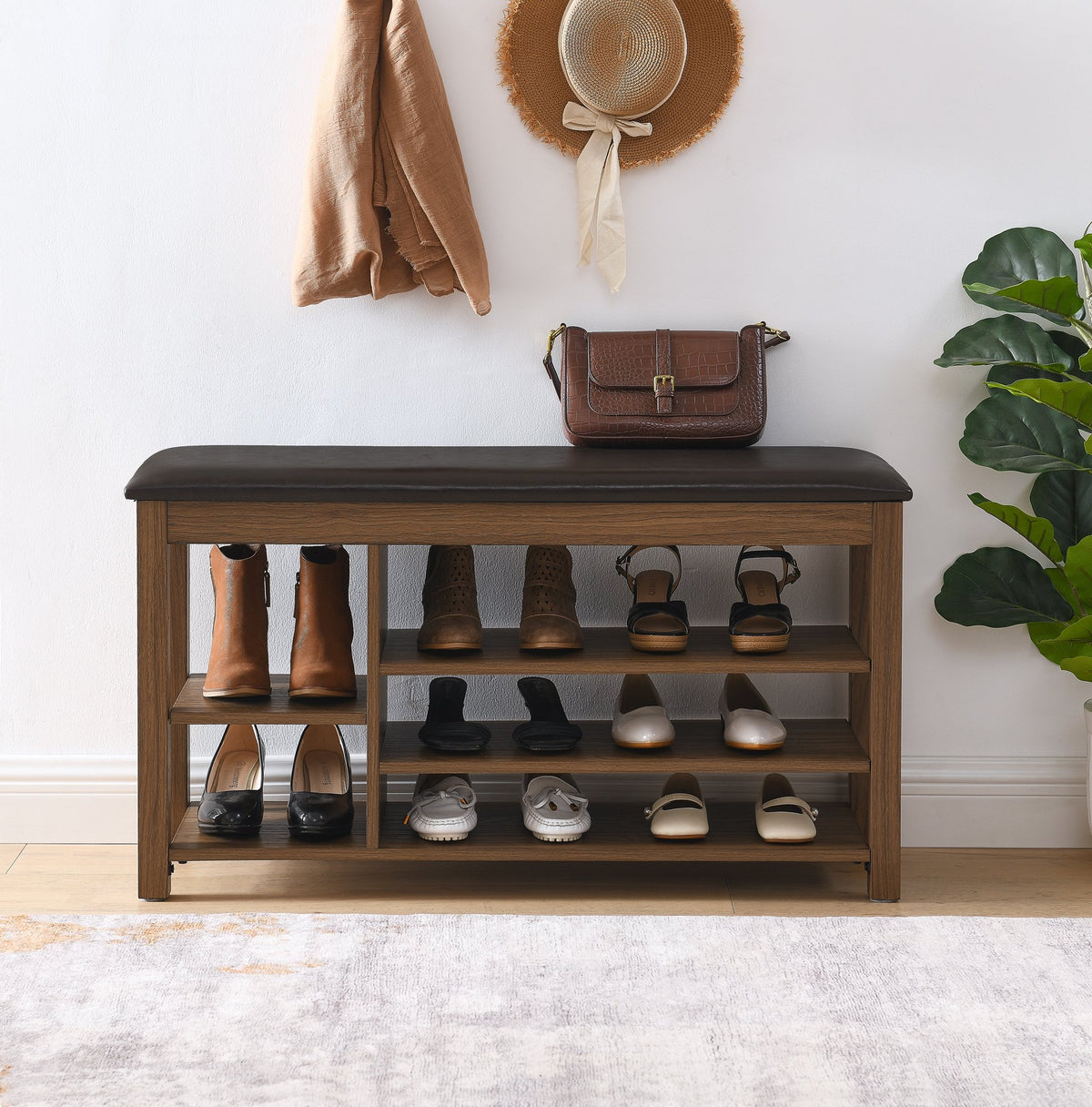 A height-adjustable long shoe-changing bench, made of natural rubberwood, comes with a comfortable seat – Brown