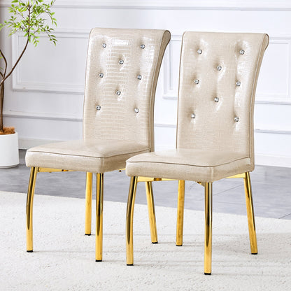A set of 2 beige and gold vintage crocodile leather cushioned dining chairs, featuring crystal clasp design and artificial leather design, adding a touch of elegance and mystery to the dining area