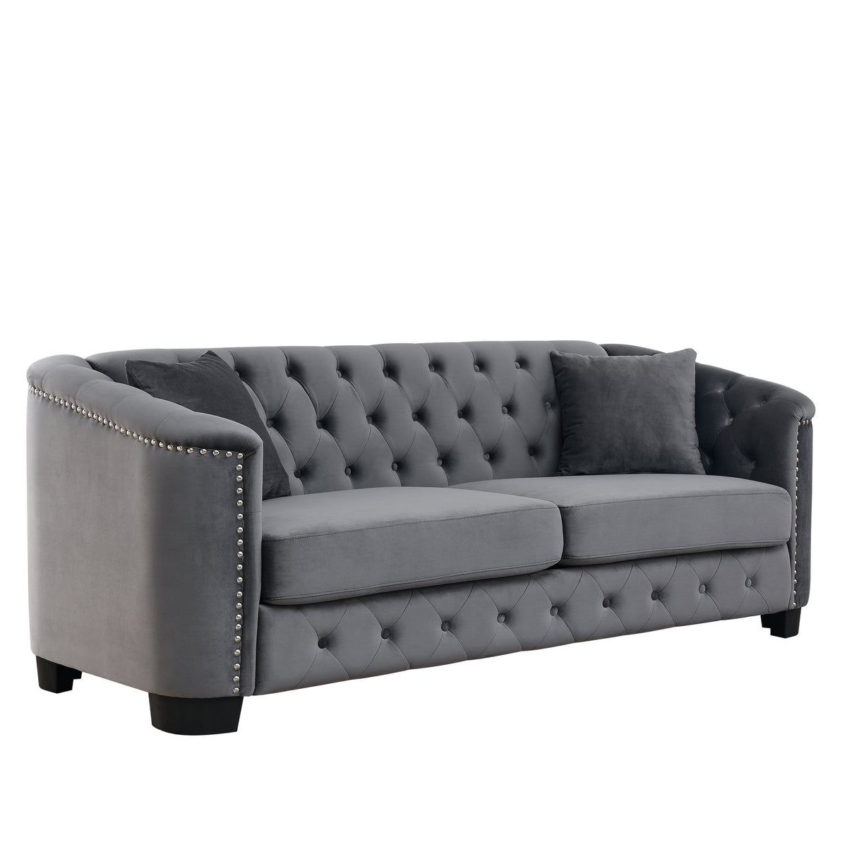 Velvet Chelsfield Sofa Set, featuring extra-deep seat cushions with padded armrests, tufted buttons, and brass studs, complete with throw pillows and plastic legs