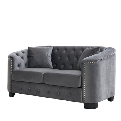 Velvet Chelsfield Sofa Set, featuring extra-deep seat cushions with padded armrests, tufted buttons, and brass studs, complete with throw pillows and plastic legs
