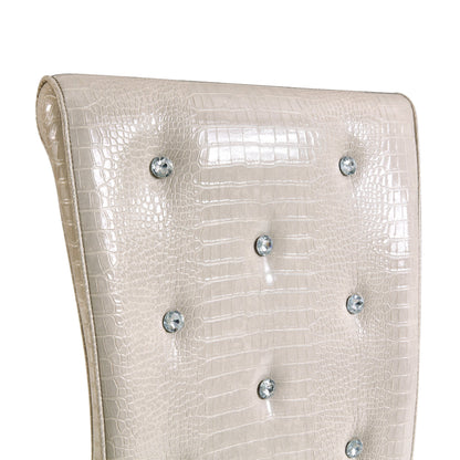 A set of 2 beige and gold vintage crocodile leather cushioned dining chairs, featuring crystal clasp design and artificial leather design, adding a touch of elegance and mystery to the dining area